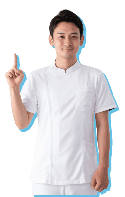 白衣を着た男性が人差し指を立てている写真